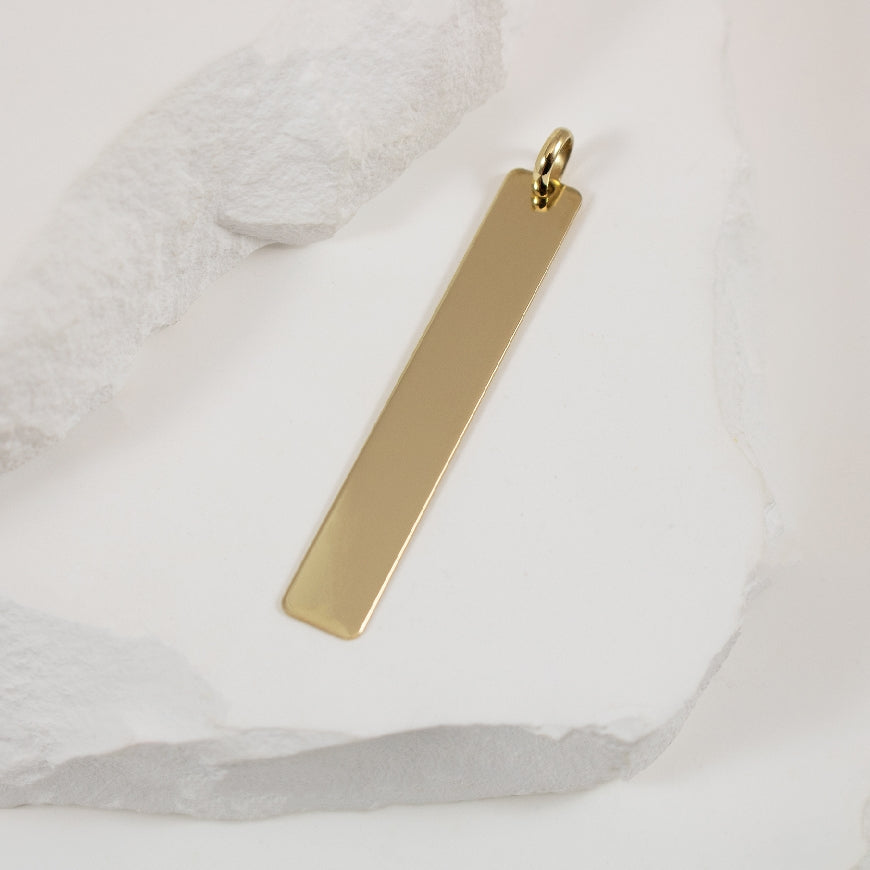 10KY Vertical Bar Pendant                             

10K Yellow Gold Vertical Bar Pendant 

40mm Length

1.20 Grams
