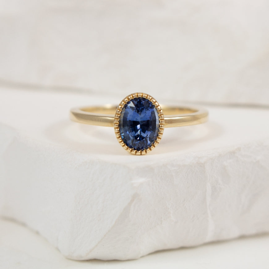 14KY Oval Cut Milgrain Bezel Sapphire Ring       

14K Yellow Gold Sapphire Milgrain Bezel Ring

1.03 Carat Oval Cut Sapphire

Finger Size 

