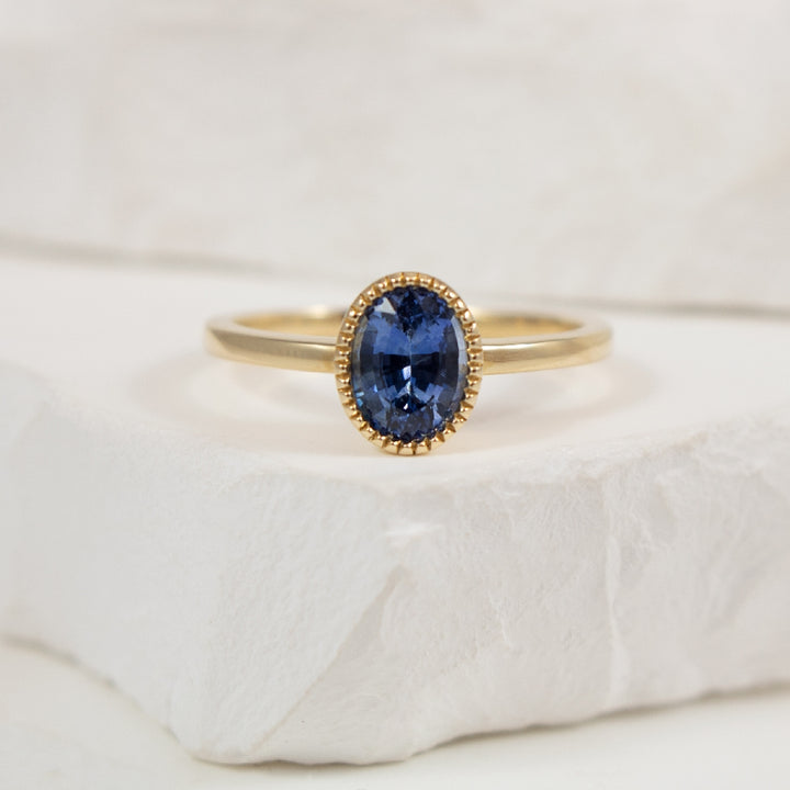 14KY Oval Cut Milgrain Bezel Sapphire Ring       

14K Yellow Gold Sapphire Milgrain Bezel Ring

1.03 Carat Oval Cut Sapphire

Finger Size 

