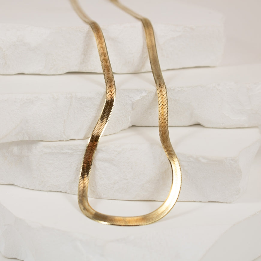 Reign Collection SS & 23K GP Flat Snake Chain     

Reign Collection Sterling Silver & 23K Gold Plate Flat Snake Chain 

3MM Wide

Chain Length 16' (Adjustable)

