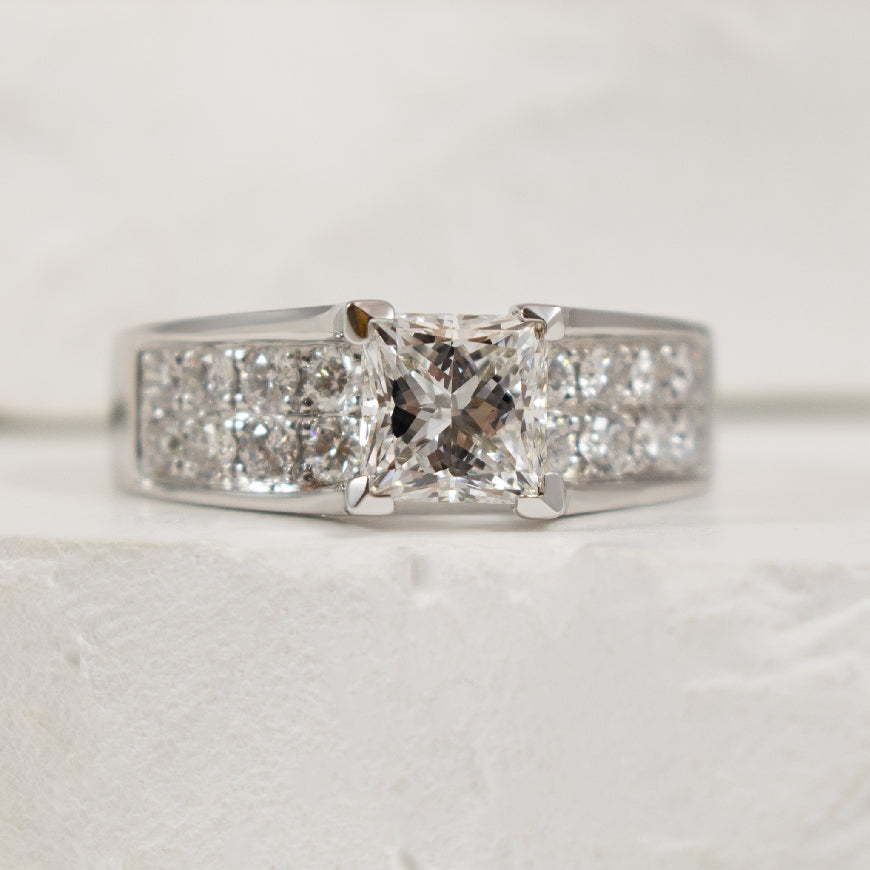 14KW S.Kashi Princess Cut Diamond Engagement Ring 

14K White Gold S.Kashi Princess Lab Grown Diamond Micro Pave Accented Engagement Ring 

Center Diamond - 1.20 Carat Princess Cut Lab Grown Diamond of   VVS2 Clarity, E Colour, Excellent/ Excelle
