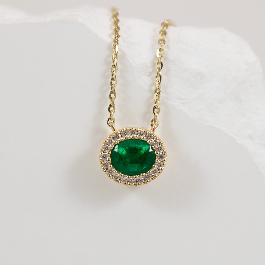 14KY Oval Cut Emerald & Diamond Halo Necklace      

14K Yellow Gold Emerald & Natural Diamond Halo Necklace 

0.30 Carat of Natural Oval Cut Emerald 
0.06 Total Natural Diamond Weight SI1-2 Clarity, G-H Colour 

Chain Length 18' (Adjustable)
