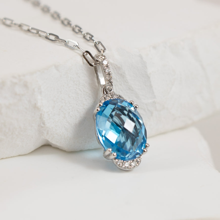 14KW Blue Topaz & Diamond Necklace                

14K White Gold Blue Topaz & Diamond Necklace 

3.35 Carat of Blue Topaz 

0.06 Total Natural Diamond Weight 

Chain Length 

