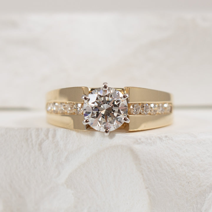14KY 1.01CT Diamond Accented Engagement Ring               

14K Yellow Gold Lab Grown & Natural Diamond Engagement Ring

Center - 1.01 Carat Round Brilliant Cut Lab Grown Diamond of VS1 Clarity, E Colour, Excellent/ Excellent/ Excellent Cut  

