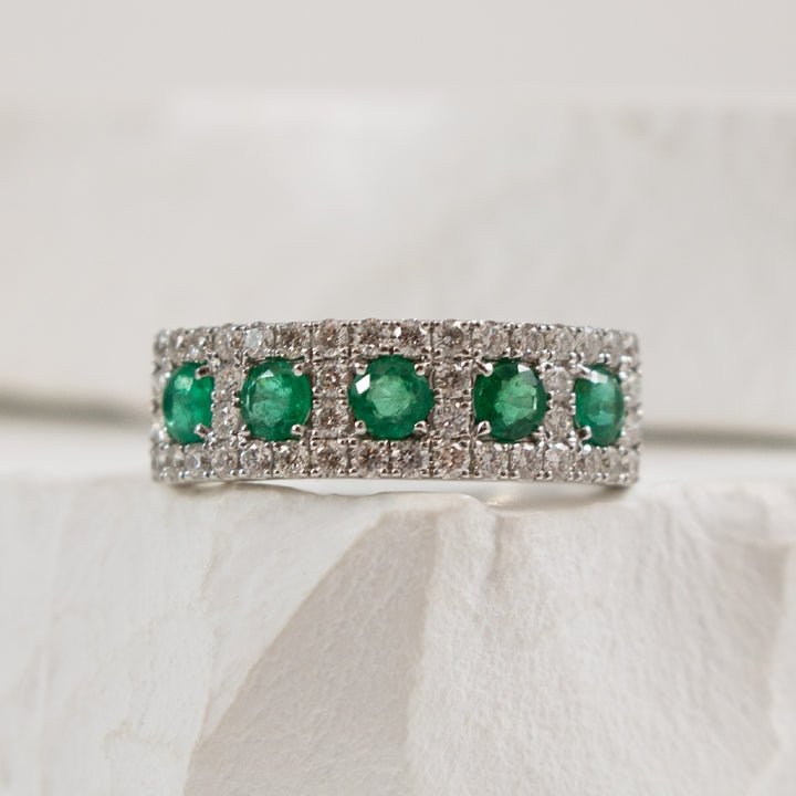 14KW Emerald & Diamond Five Stone Ring                      

14K White Gold Emerald & Diamond Five Stone Ring 

0.60 Carats of Emeralds

0.64 Carat Total Diamond Weight of SI1-2 Clarity, GH Colour 

6.5mm Wide 

Finger Size 6.5 