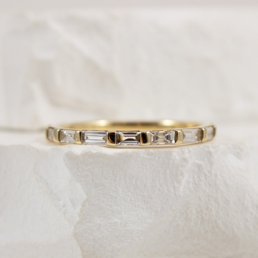 14KY Baguette Cut Diamond Band                    

14K Yellow Gold Natural Baguette Cut Diamond Band

0.50 Total Natural Diamond Weight VS Clarity, FG Colour

Finger Size 6.5

