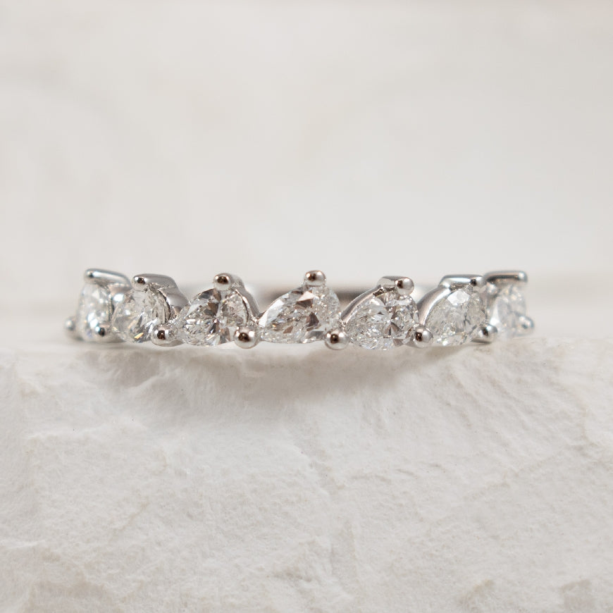 14KW Pear Shaped Diamond Band                     

14K White Gold Natural Pear Shaped Diamond Band

0.56 Total Natural Diamond Weight SI Clarity, GH Colour

Finger Size 6.5

