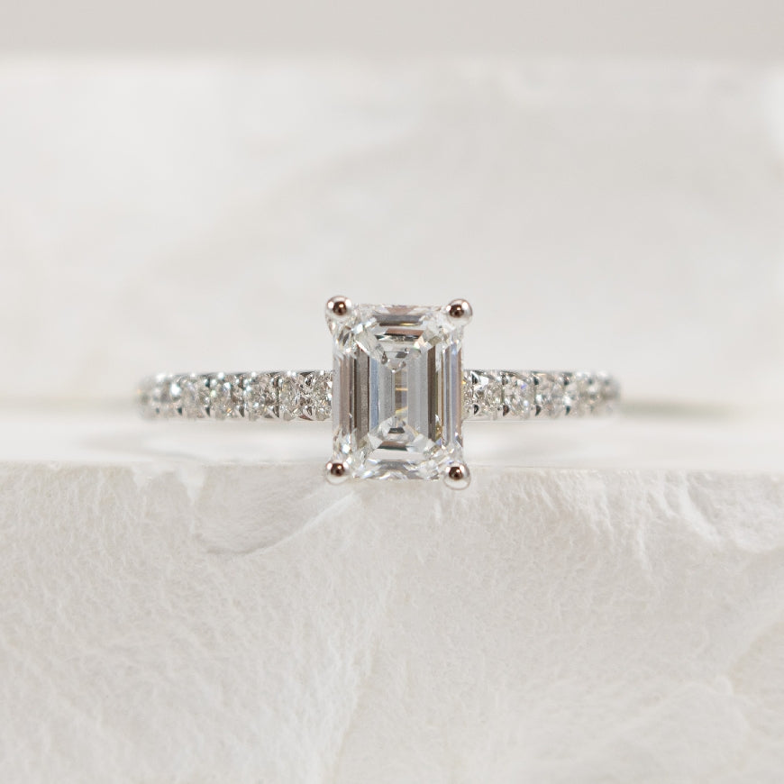 14KW S.Kashi Emerald Cut Diamond Engagement Ring                

14K White Gold S.Kashi Emerald Cut Lab Grown & Natural Diamond Accented Engagement Ring 

1.00 Carat Emerald Cut Lab Grown Diamond of VS2 Clarity, D Colour, Very Good Cut 

0.44 
