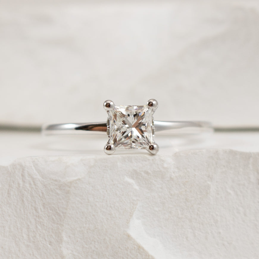 14KW S.Kashi Princess Cut Diamond Engagement Ring                

14K White Gold S.Kashi Princess Cut Canadian Natural Diamond Solitaire Engagement Ring 

0.70 Carat Princess Cut Canadian Natural Diamond of SI1-2 Clarity, G Colour, Very Good Cut