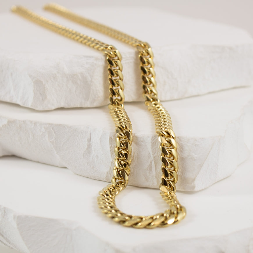 10K Yellow Gold Miami Cuban Chain 

5mm Width 

38.9 Grams

Chain Length 22'
