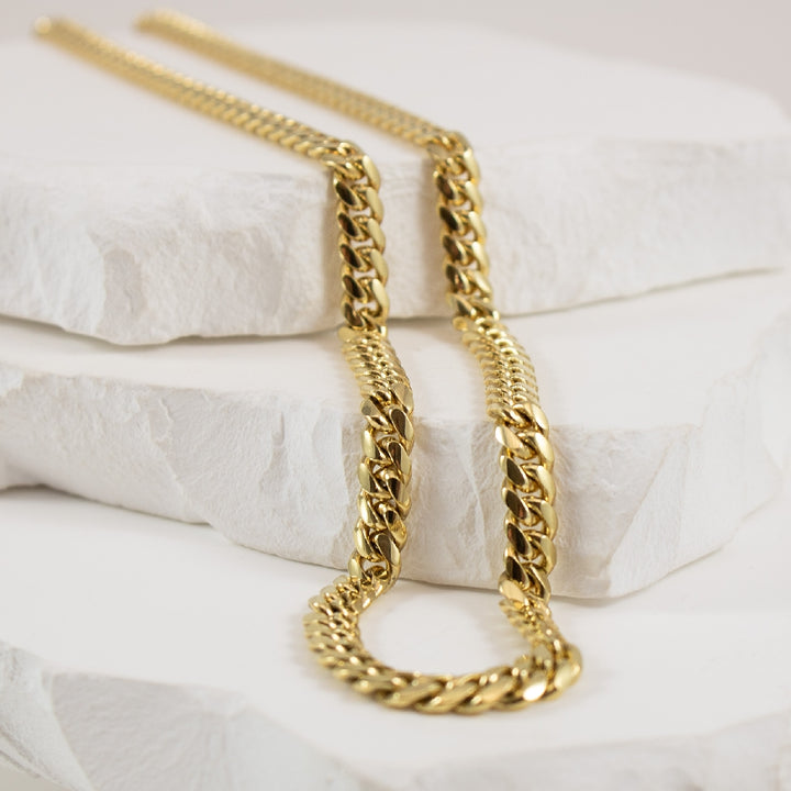 10K Yellow Gold Miami Cuban Chain 

5mm Width 

38.9 Grams

Chain Length 22'
