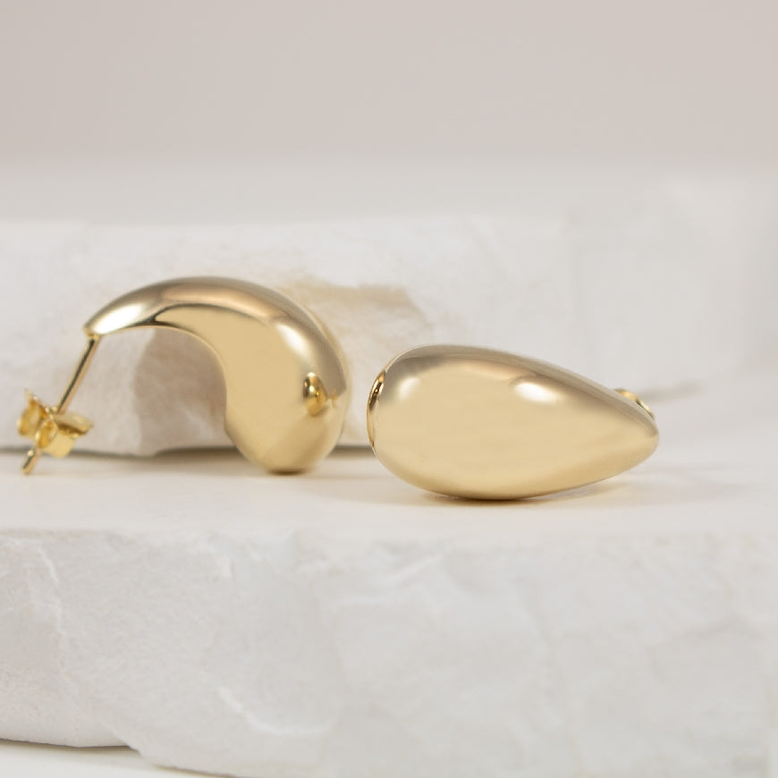 14KY Puffy Teardrop Hoop Earrings                     

14K Yellow Gold Puffy Teardrop Hoop Earrings 

Earring Closure Post with Butterfly Back

3.33 Grams 



