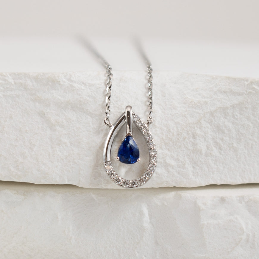 14KW Sapphire & Diamond Open Pear Necklace               

14K White Gold Roman & Jules Open Pear Shaped Sapphire & Diamond Necklace 

0.18 Carat Pear Shaped Sapphire

0.08 Total Natural Diamond Weight 

Chain Length 18' Adjustable 
