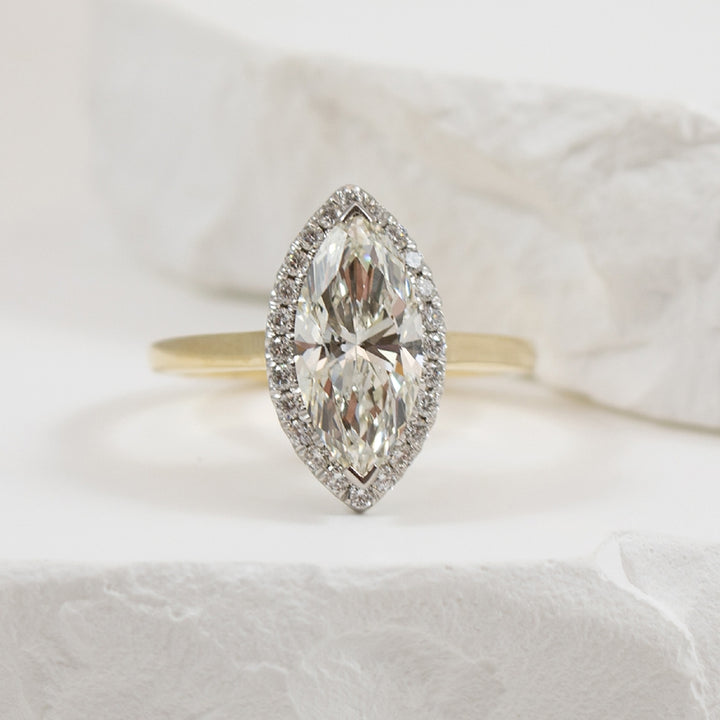 14KY 2.04CT Marquise Halo Diamond Engagement Ring 

14K Yellow Gold Marquis Lab Grown Diamond Halo Engagement Ring 
 
Center - 2.04 Carat Marquis Cut Lab Grown Diamond of 
VVS2 Clarity, E Colour, Excellent/ Excellent Cut, IGI Certified 

Accen