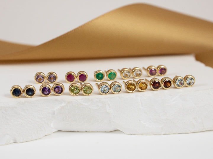 10KY Bezel Set Solitaire Blue Topaz Earrings