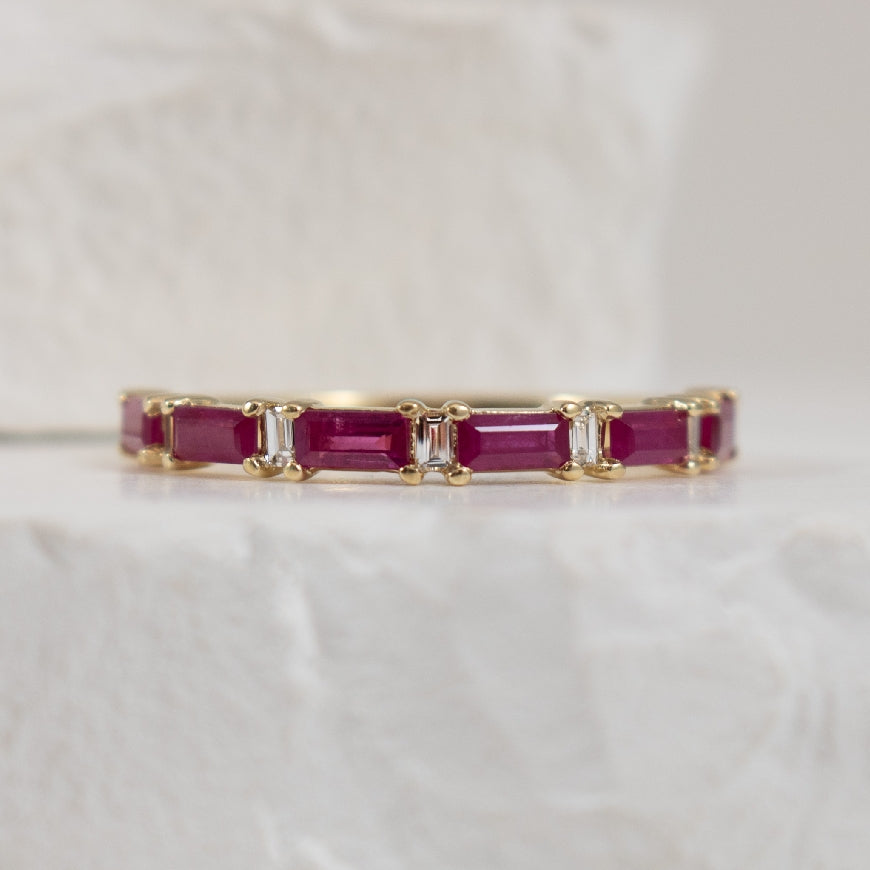 14KY Baguette Cut Ruby & Diamond Band 

14K Yellow Gold Baguette Cut Ruby & Diamond Band 

0.14 Total Diamond Weight of SI2 Clarity, GH Colour 
