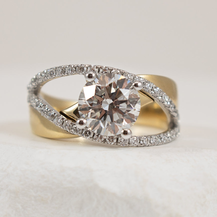 14K Yellow & White Gold Lab Grown Diamond Engagement Ring 

2.08 Carat of Round Brilliant Cut Lab Grown Diamond of VS1 Clarity, F Colour, Ideal/Excellent/Excellent Cut

0.50 Total Lab Grown Diamond Weight of VS Clarity

