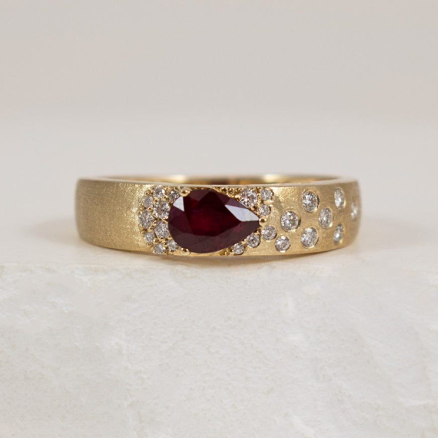 14K Yellow Gold Ruby & Diamond Brushed Gold Ring 

0.59 Carat of Pear Shaped Ruby 

0.15 Total Natural Diamond of SI Clarity, GH Colour

Finger Size 6.5

