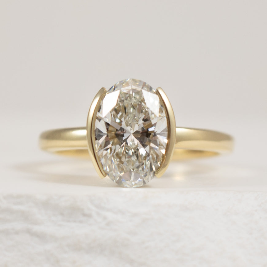 14KY Oval Diamond Half Bezel Set Engagement Ring  

14K Yellow Gold Lab Grown Oval Cut Diamond Hidden Halo & Half Bezel Set Engagement Ring

Center - 2.07 Carat of Lab Grown Oval Cut Diamond of VS1 Clarity, F Colour, Excellent/Excellent Cut, IGI 