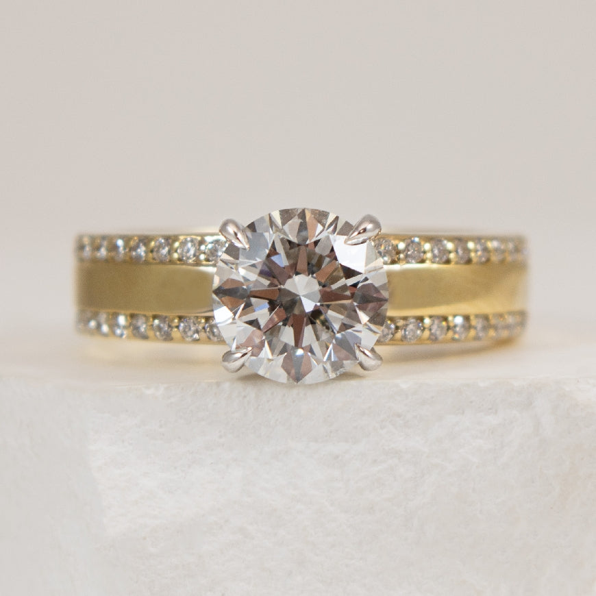 14KY 1.56CT Diamond Accented Engagement Ring      

14K Yellow Gold Lab Grown Diamond Accented Engagement Ring 

Center - 1.56 Carat Round Brilliant Cut Lab Grown Diamond of SI2 Clarity, D Colour, Ideal Cut

Accent - 0.19 Carats Lab Grown Diamo