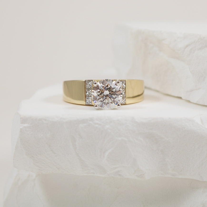 14KY S.Kashi 1.50CT Round Diamond Engagement Ring  

14K Yellow Gold S.Kashi Lab Grown & Natural Diamond Accented Engagement Ring 

Center: 1.50 Carat Round Brilliant Cut Lab Grown Diamond of VS1 Clarity, E Colour, Excellent/ Excellent/Excellent 