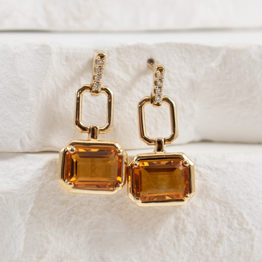 10K Citrine & Diamond Drop Earrings

7x5MM Emerald Cut Citrines

0.03 Total Diamond Weight 
