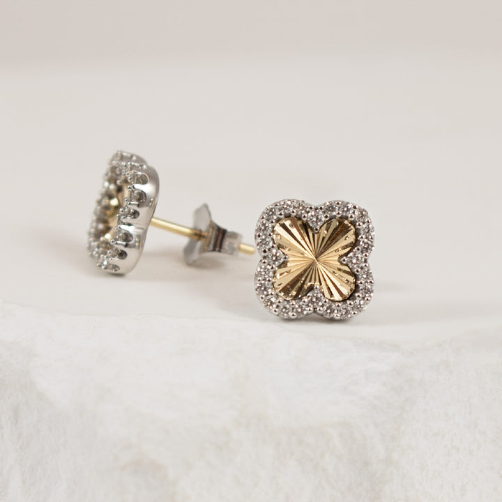 10KYW Diamond Clover Fluted Stud Earrings         

10K Yellow & White Gold Diamond Clover Fluted Stud Earrings

0.20 Total Natural Diamond Weight 

Earring Closure Post with Butterfly Back 


