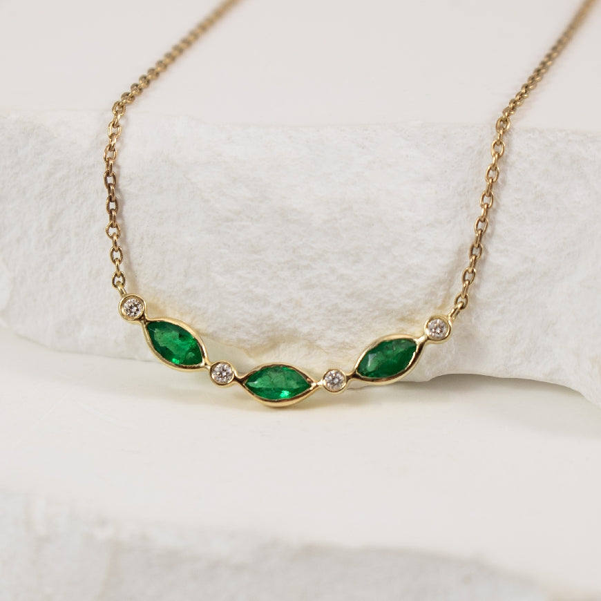 10KY Petite Marquise Emerald & Diamond Necklace   

10K Yellow Gold Petite Marquise Cut Emerald & Diamond Necklace 

3x 4x2MM Emeralds
0.03 Total Diamond Weight 

Chain Length 18' (Adjustable to 16')

