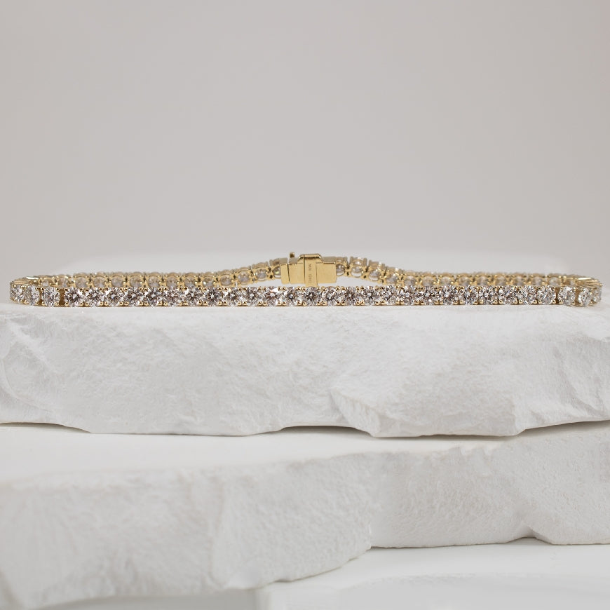 10KY 5.00TDW Lab Grown Diamond Tennis Bracelet    

10K Yellow Gold Lab Grown Diamond Tennis Bracelet

5.00 Total Lab Grown Diamond Weight of VS2 Clarity. F Colour, Very Good Cut

*Delicate Design*

Bracelet Length 7.5