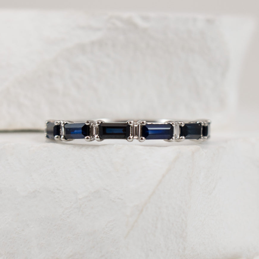 14KW Baguette Sapphire & Diamond Band             

14K White Gold Natural Diamond & Sapphire Baguette Cut Band 

0.14 Total Natural Diamond Weight SI2 Clarity, GH Colour  

