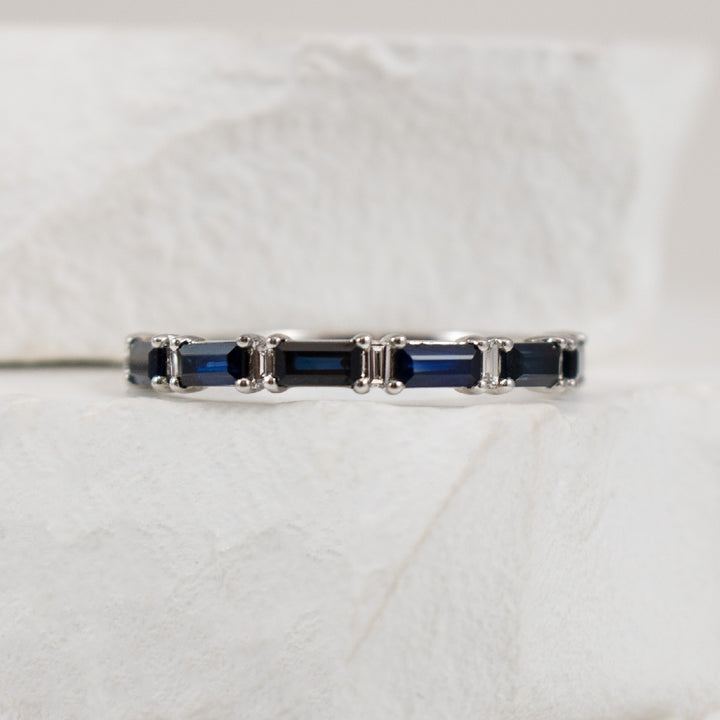 14KW Baguette Sapphire & Diamond Band             

14K White Gold Natural Diamond & Sapphire Baguette Cut Band 

0.14 Total Natural Diamond Weight SI2 Clarity, GH Colour  

