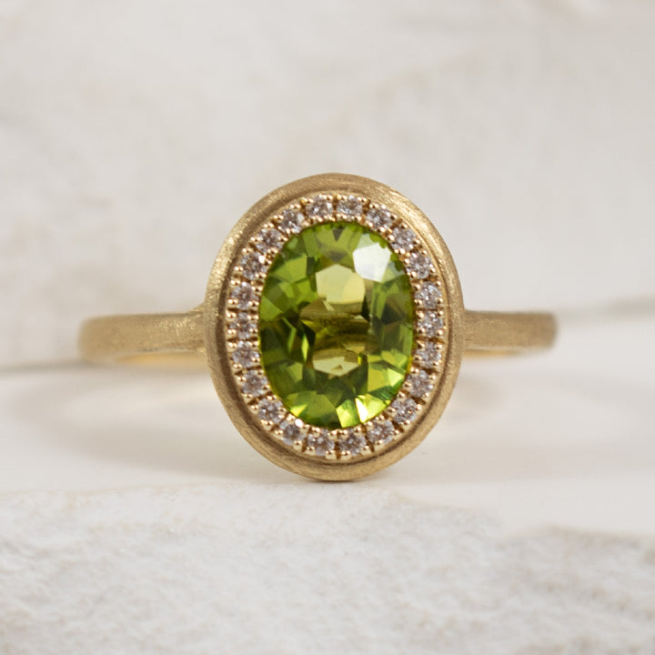 14K Yellow Gold Peridot & Diamond Bezel Set Ring

1.28 Carat Oval Cut Peridot

0.12 Total Natural Diamond Weight 

Finger Size 

