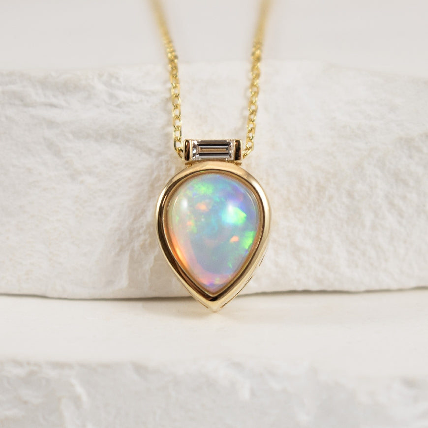 14K Yellow Gold Pear Shaped Bezel Set Opal Necklace with Baguette Diamond Accent
